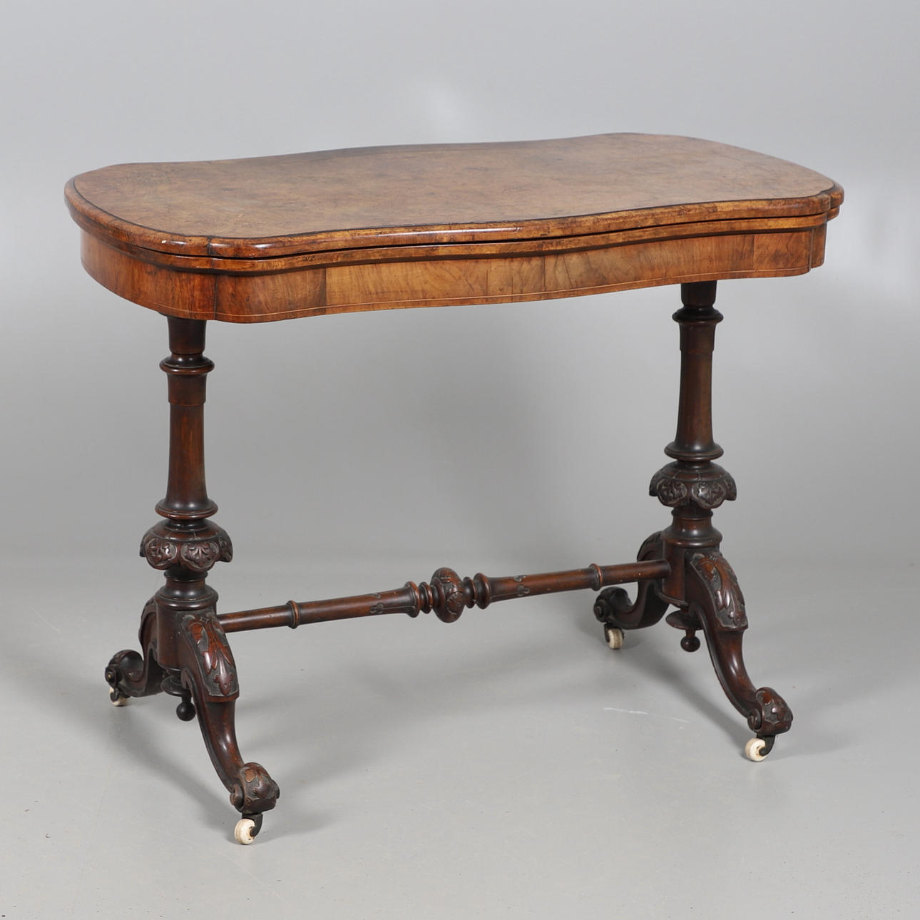 A VICTORIAN WALNUT & INLAID CARD TABLE.