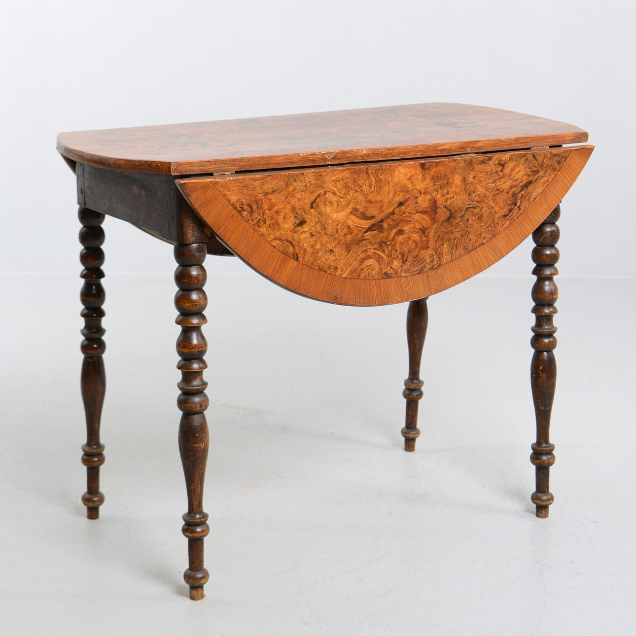 A Neo-Renaissance table with flaps, second part of the 19th century ...