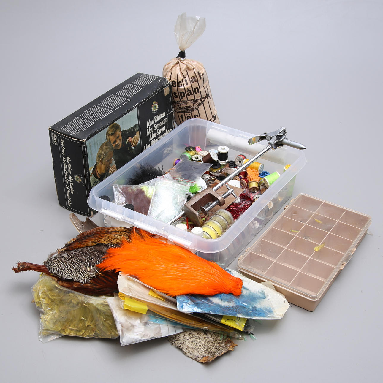 FLY BINDING SET and the ABU smoke.