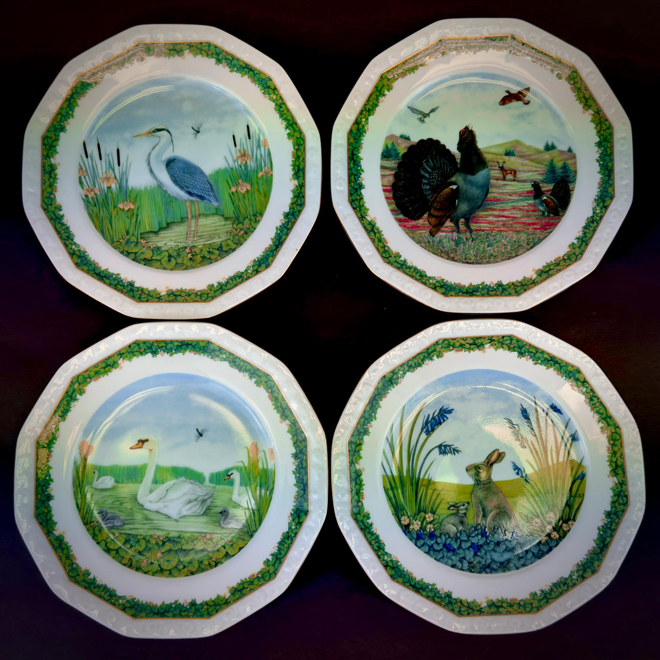 FOUR ROSENTHAL DECORATIVE PLATES.