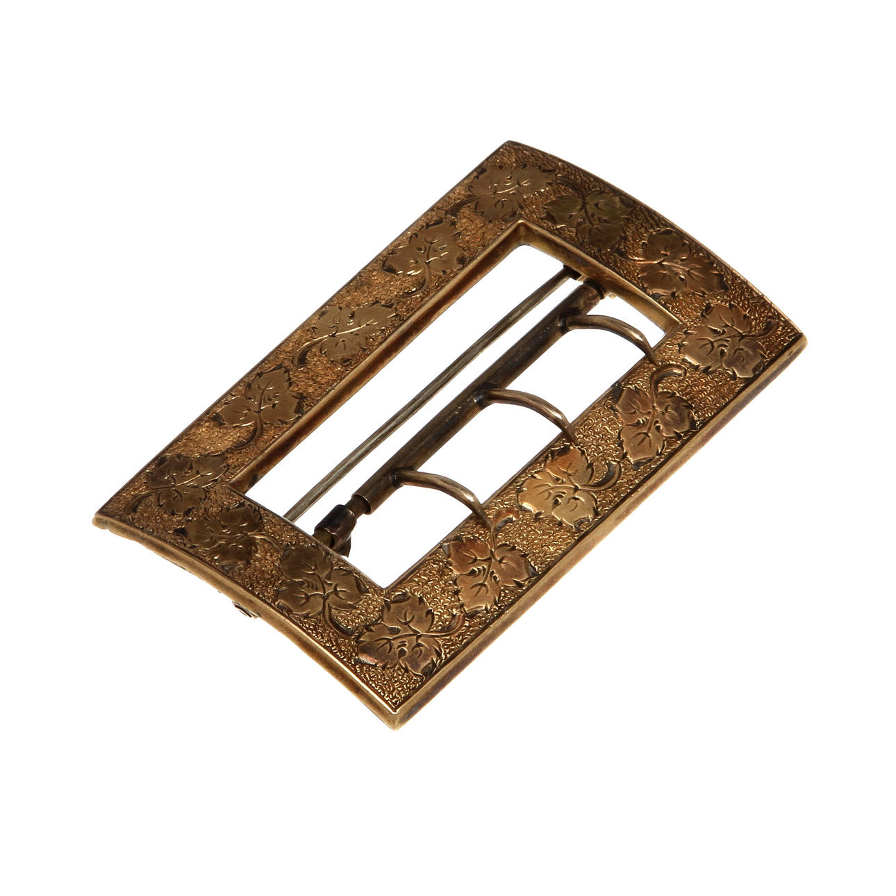 SKOSPÄNNE/BROSCH, mestadels 18 K guld. Otydlig stämpel. Total vikt 11 gram.