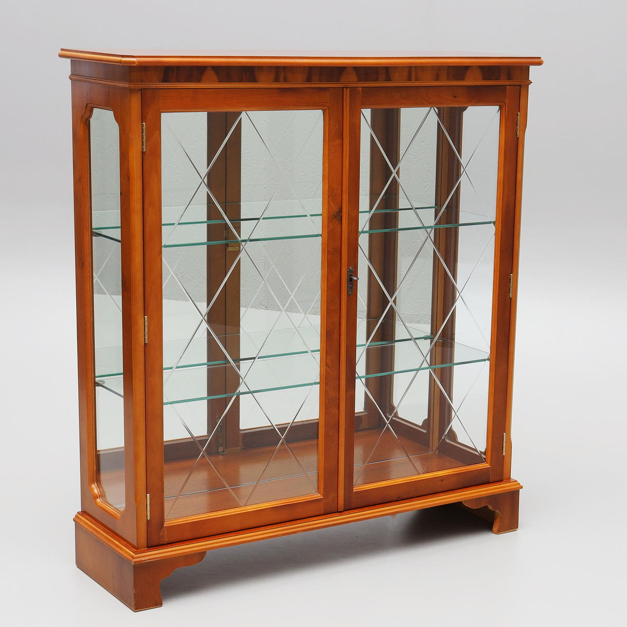 A yew cabinet, English style, 1980s.