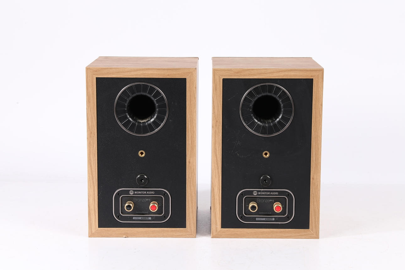 A PAIR OF MONITOR AUDIO BRONZE BX1 SPEAKERS. Miscellaneous
