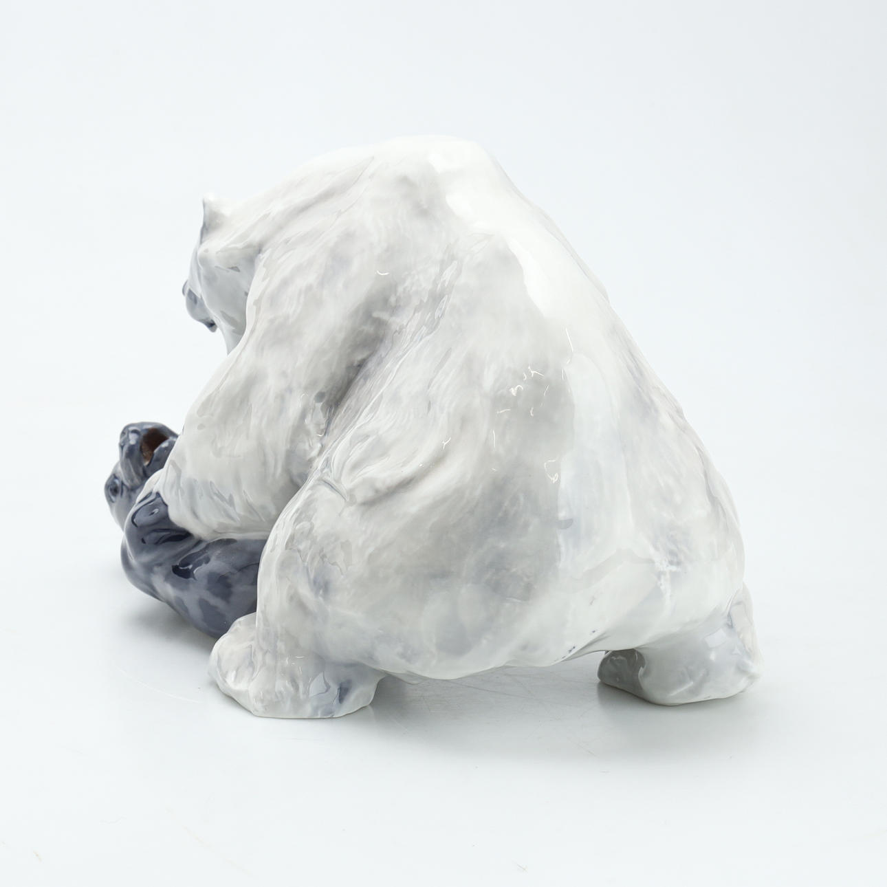 KNUD KYHN. Polar bear with seal, Royal Copenhagen model 1108