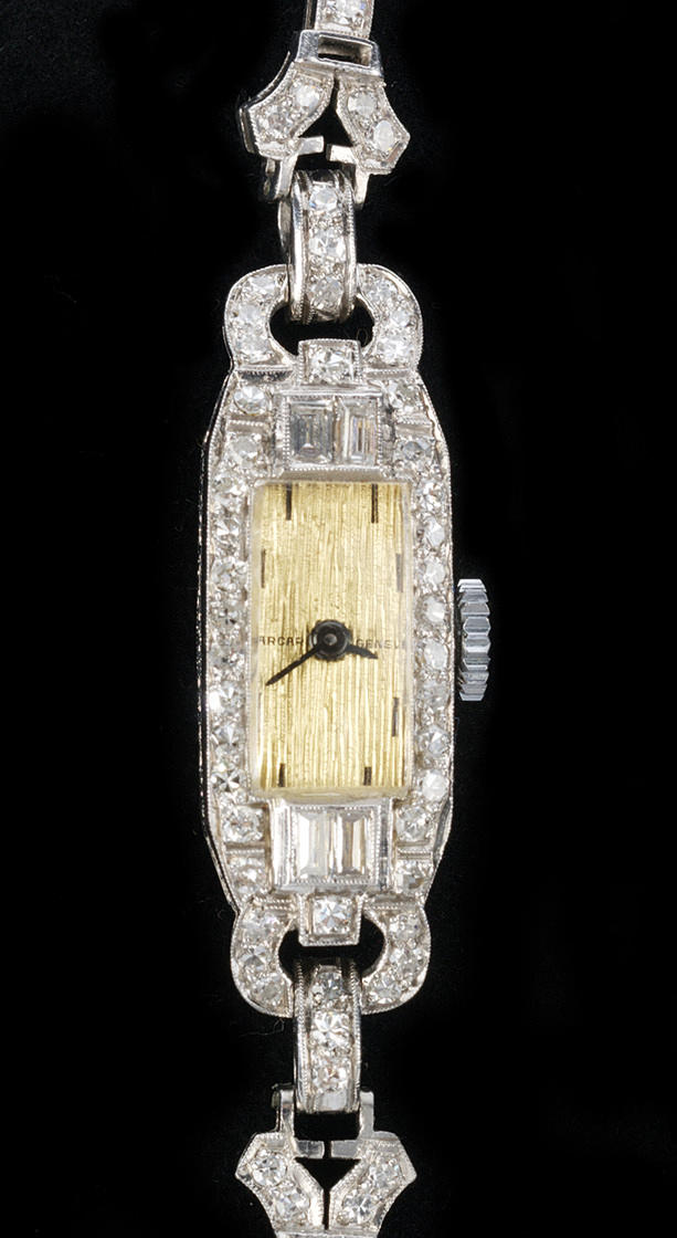 SCHMUCKUHR. Arcar Genéve, diamanter, vitguld eller platina ca. 16,9 g.