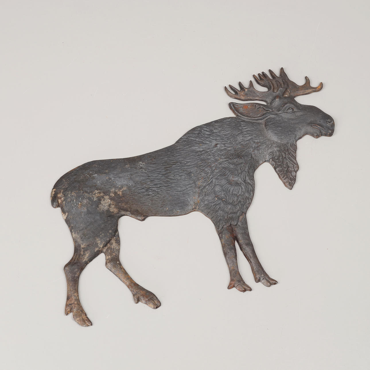 Ein Wandrelief, Elch, Gusseisen.