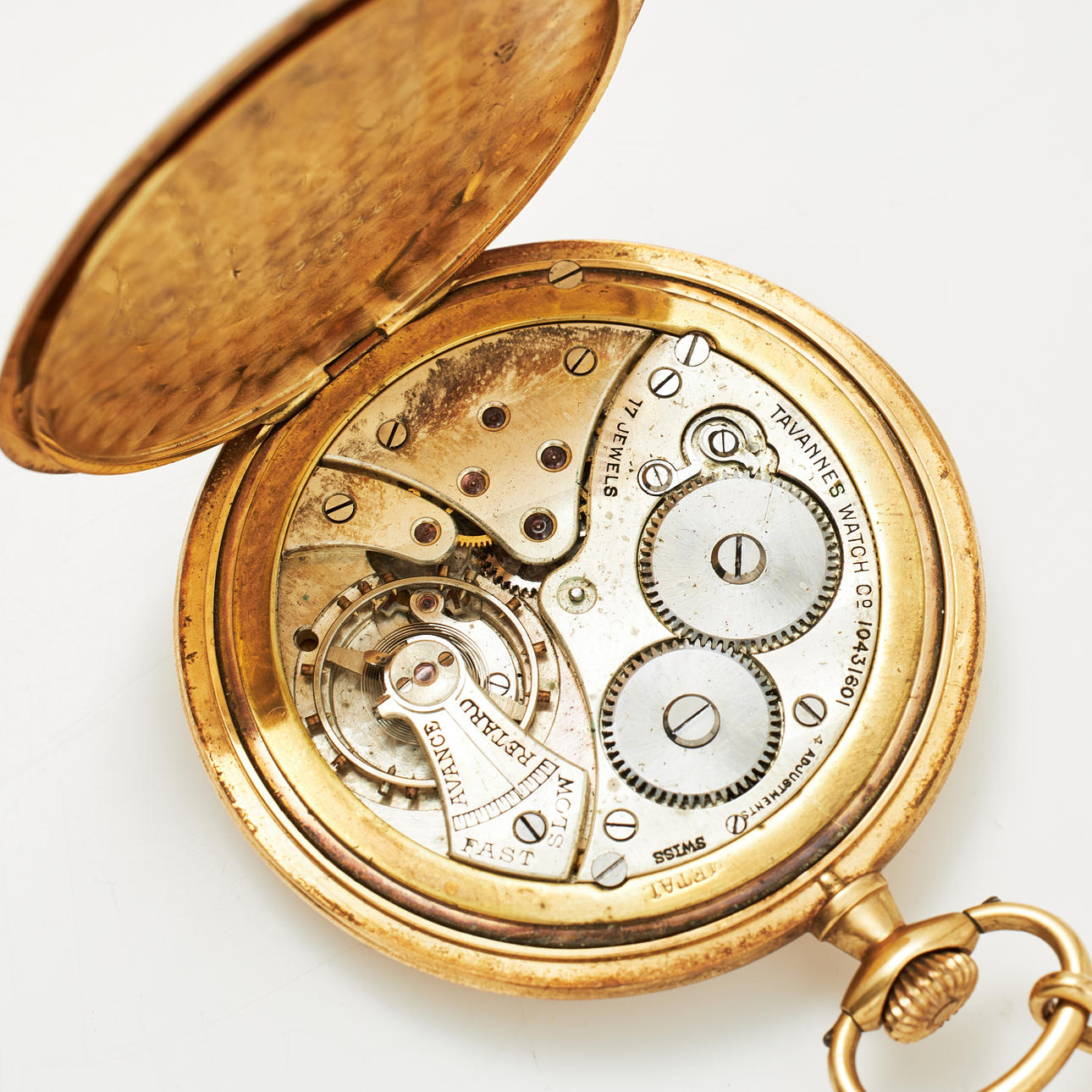 A pocket watch, Tavannes Watch Co, 18k gold, 1920s. Clocks