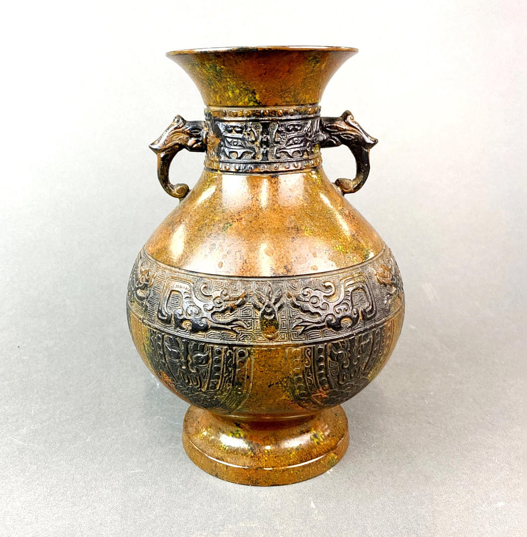CHINESE RELIEF DECORATED VASE.