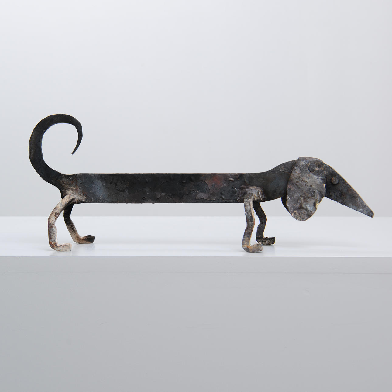 FIRE DOG, depicting dachshund, forging.