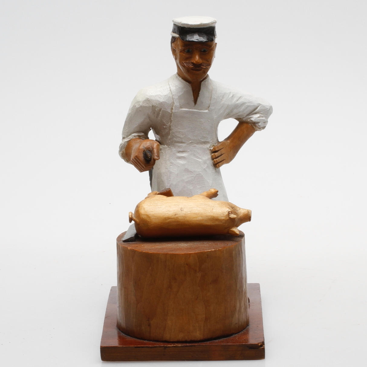 SKULPTUR, snidat trä, signerad Olov Hagborg och daterad Stockholm 1925.