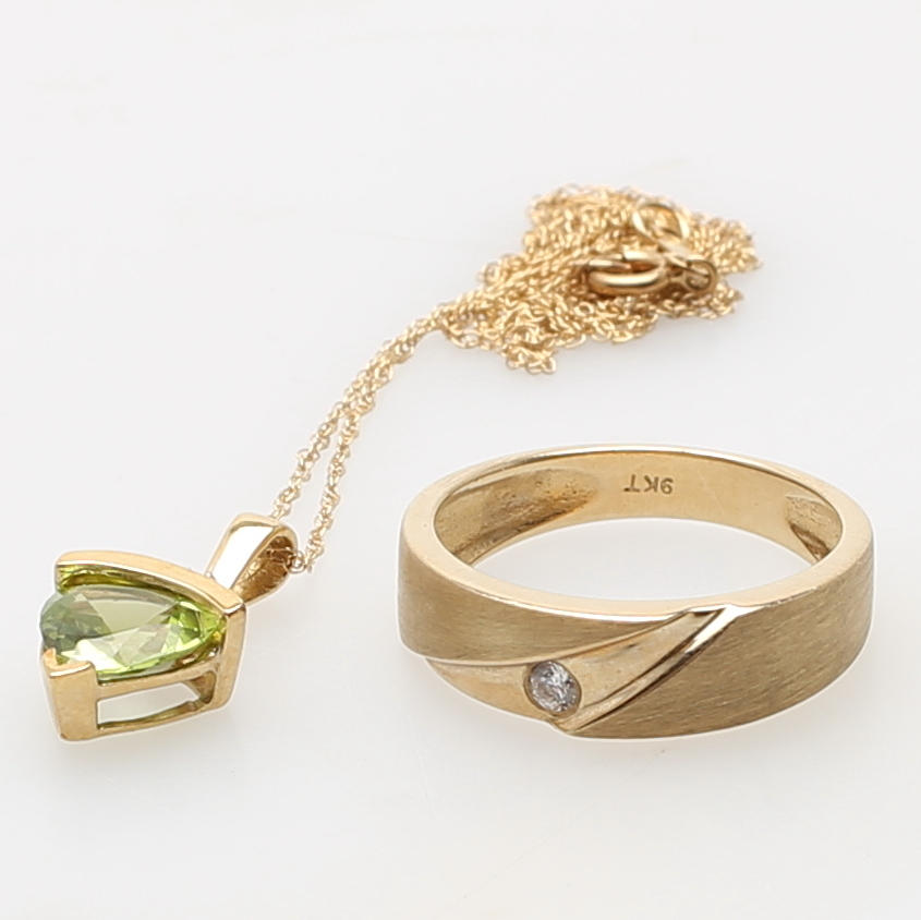 RING i 9K gulguld besatt med zirkon samt Hänge i 10K med peridot och diamant.