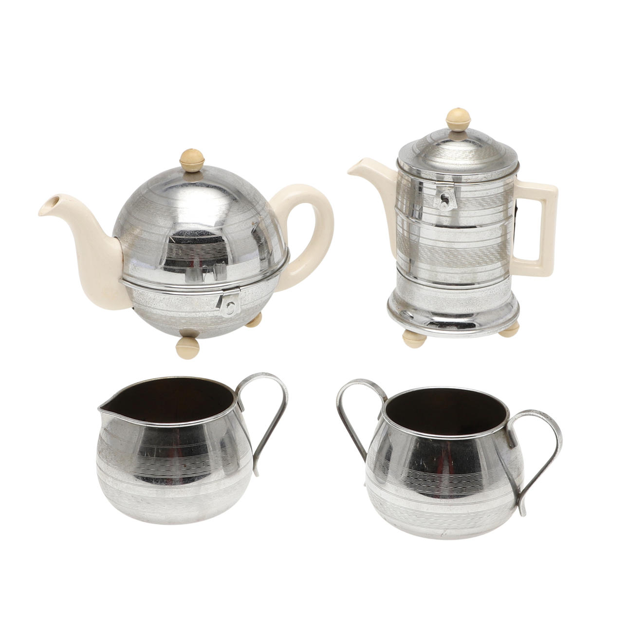 A KOSY KRAFT FOUR-PIECE TEA & COFFEE SET.