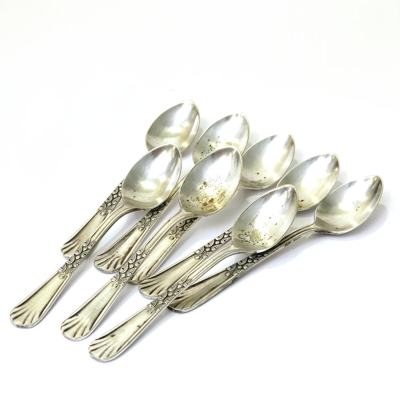 EIGHT SPOONS IN SILVER ALPACA. ART DECO ERA.