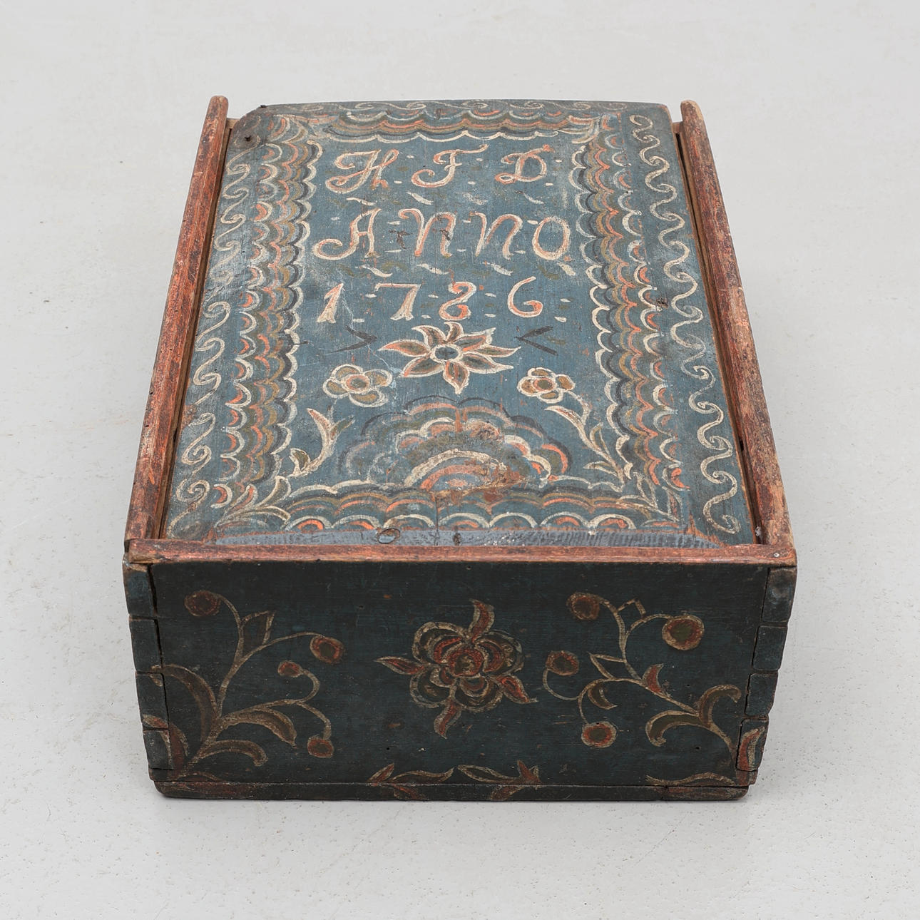 A wooden box, allmoge marked HFD 1786.