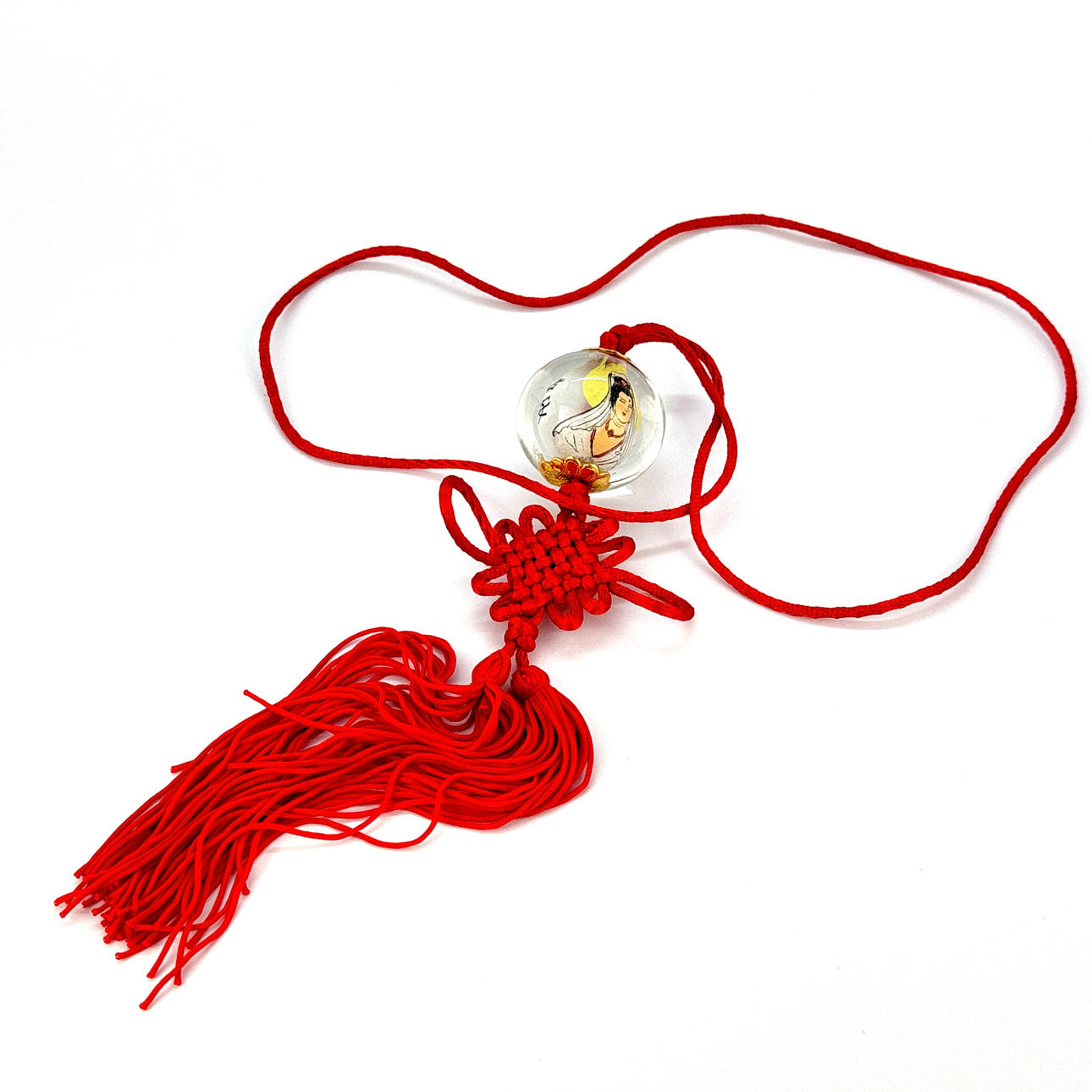 AMULETO CHINO DE VIDRIO Y SEDA.