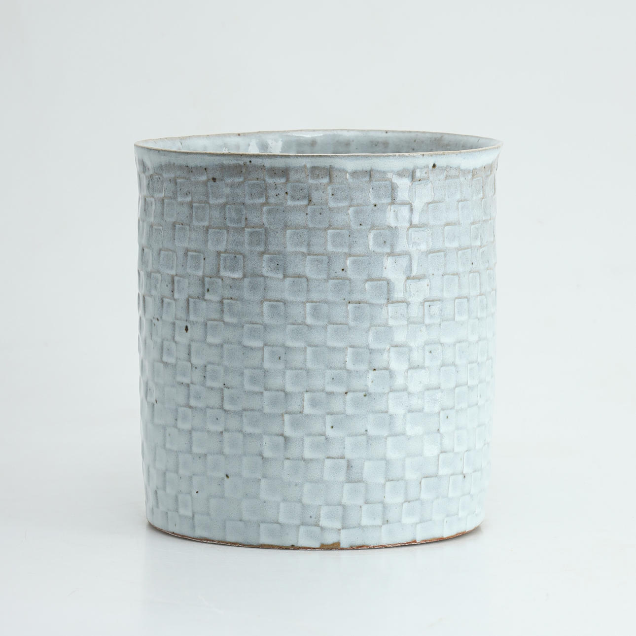 SIGNE PERSSON-MELIN. Vase/pot, stoneware, white glazed with checkerboard pattern.
