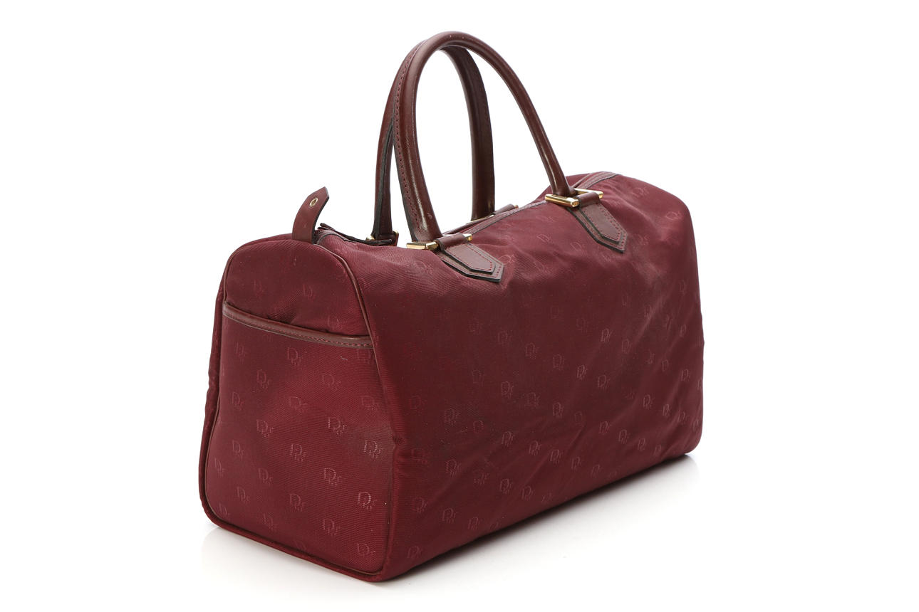 CHRISTIAN DIOR, TASCHE, burgunderrote Monogramm-Leinwand.