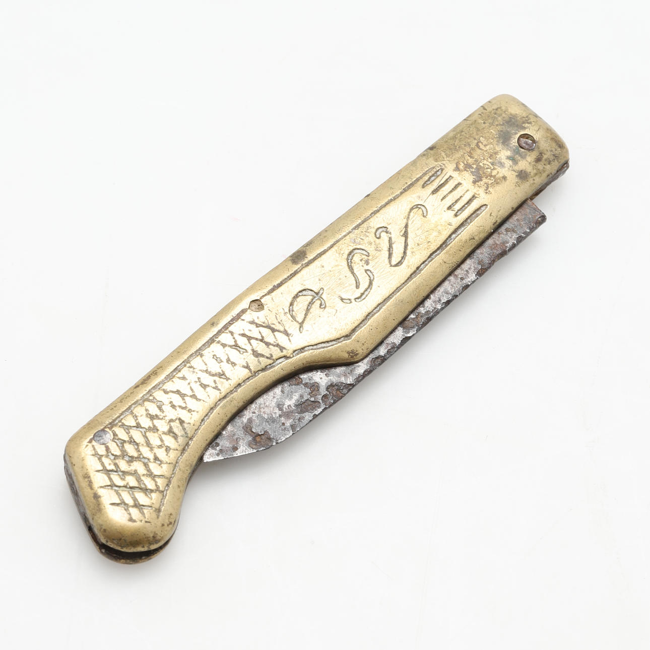 A folding knife, brass and forging, 19th century.