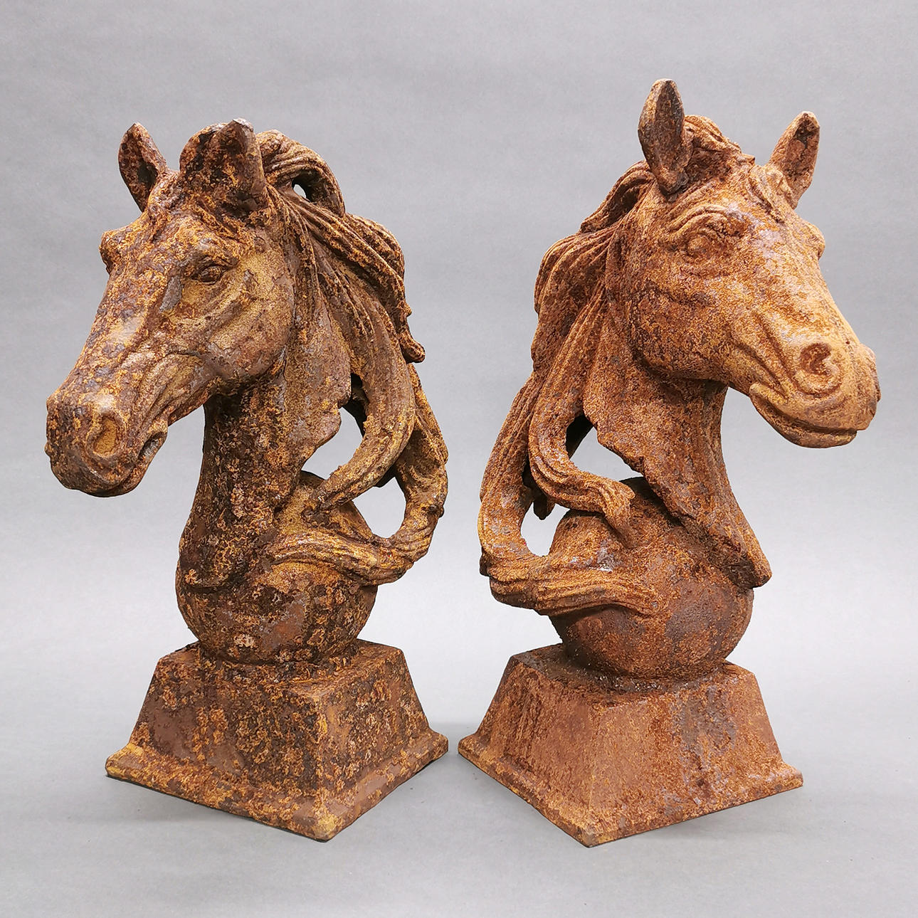 CAST IRON HORSE HEAD FIGURES.