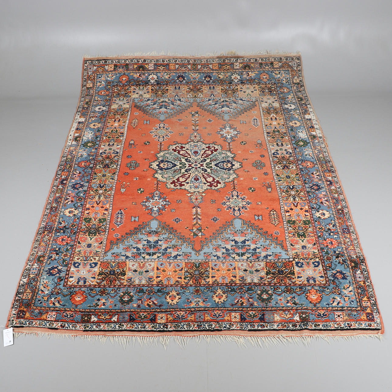 A BERBER PILE CARPET.