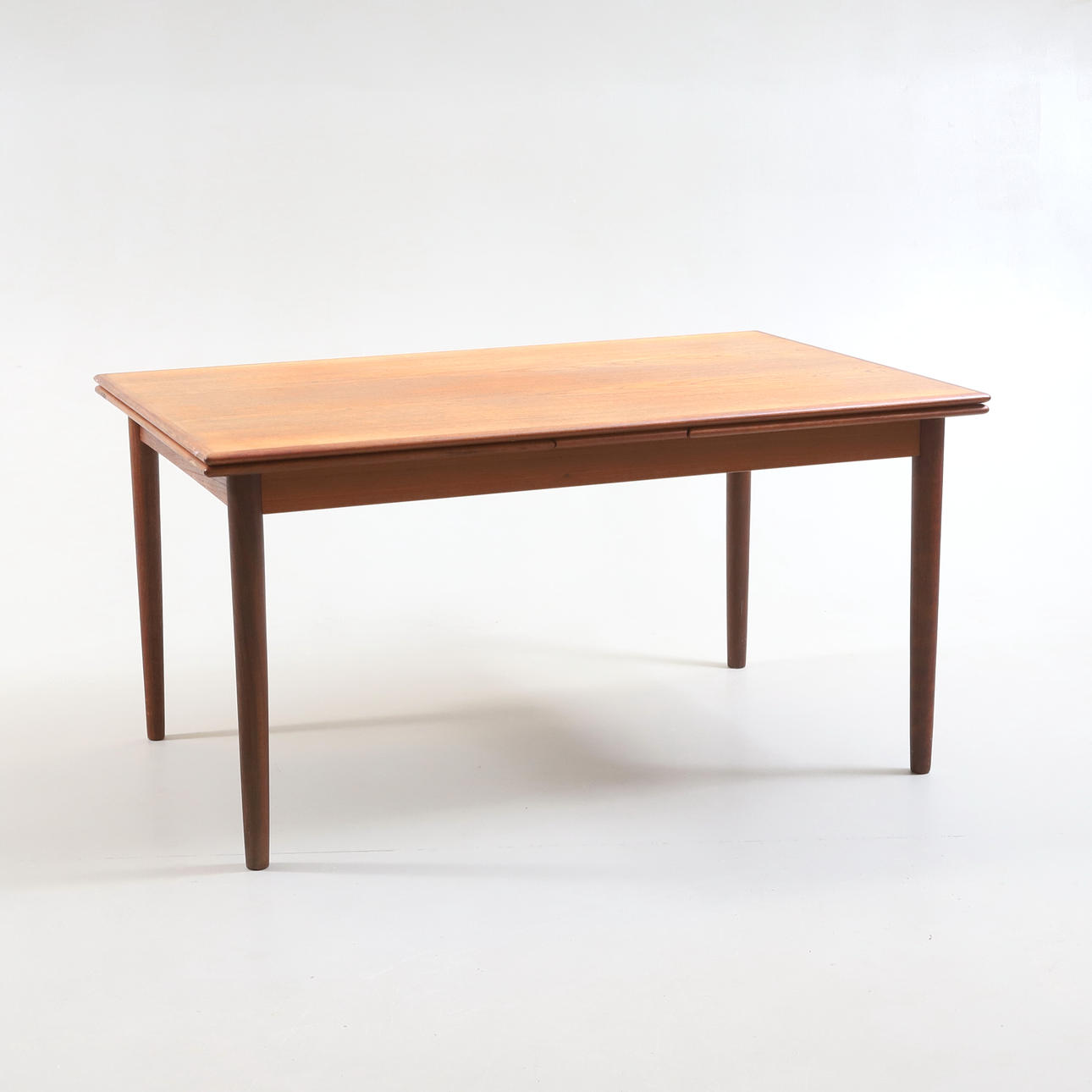 DINING TABLE, teak, rounded legs & edges, Ansager (AM) Møbler, Denmark, 1960s.