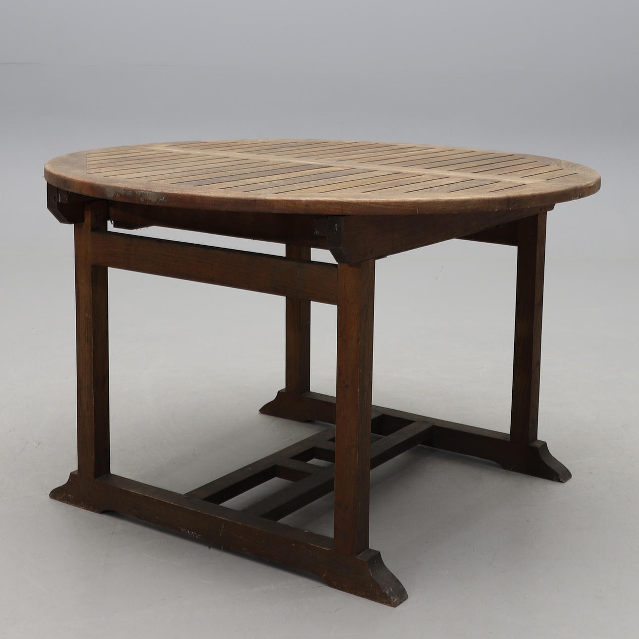 A TEAK GARDEN TABLE, Plantation Timbers.