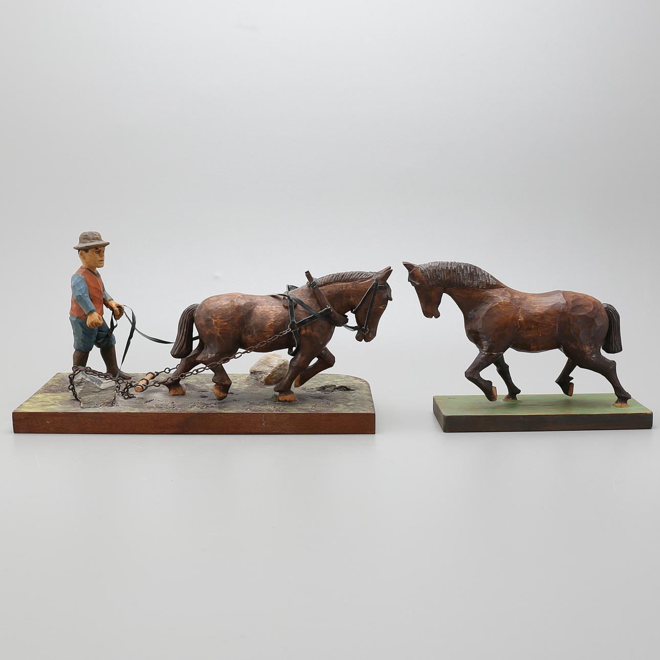 SKULPTURER, 2 st, bonde, hästar, snidat trä, signerad F.G.