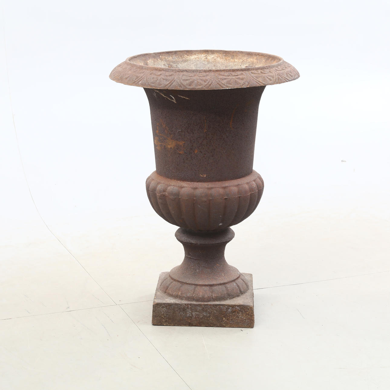 A cast iron urn.