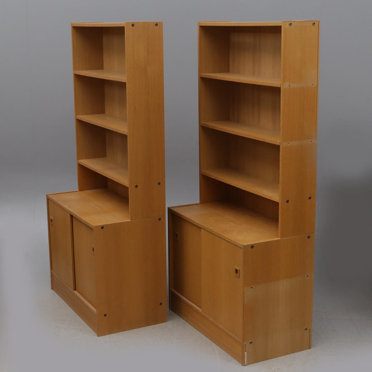 BOKHYLLOR, 2 st, ek, med skjutluckor.