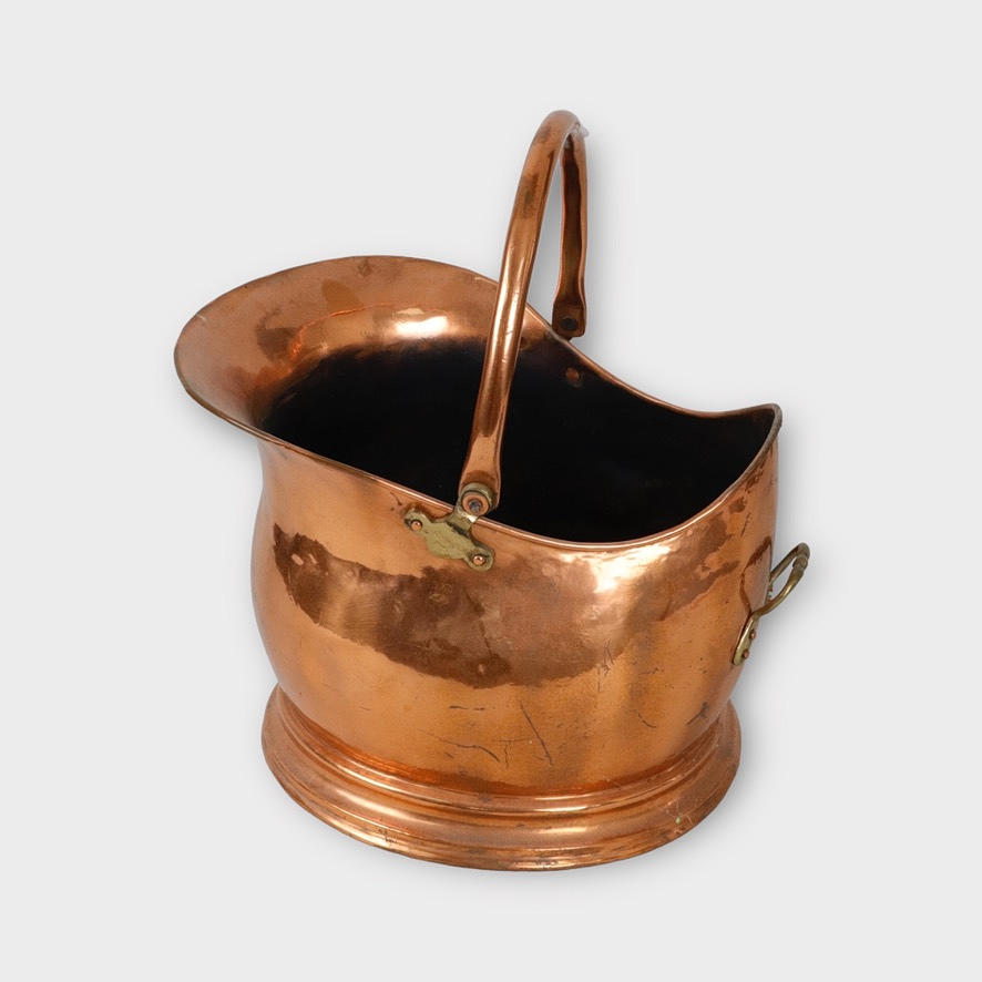A copper charcoal collector, 20th century.