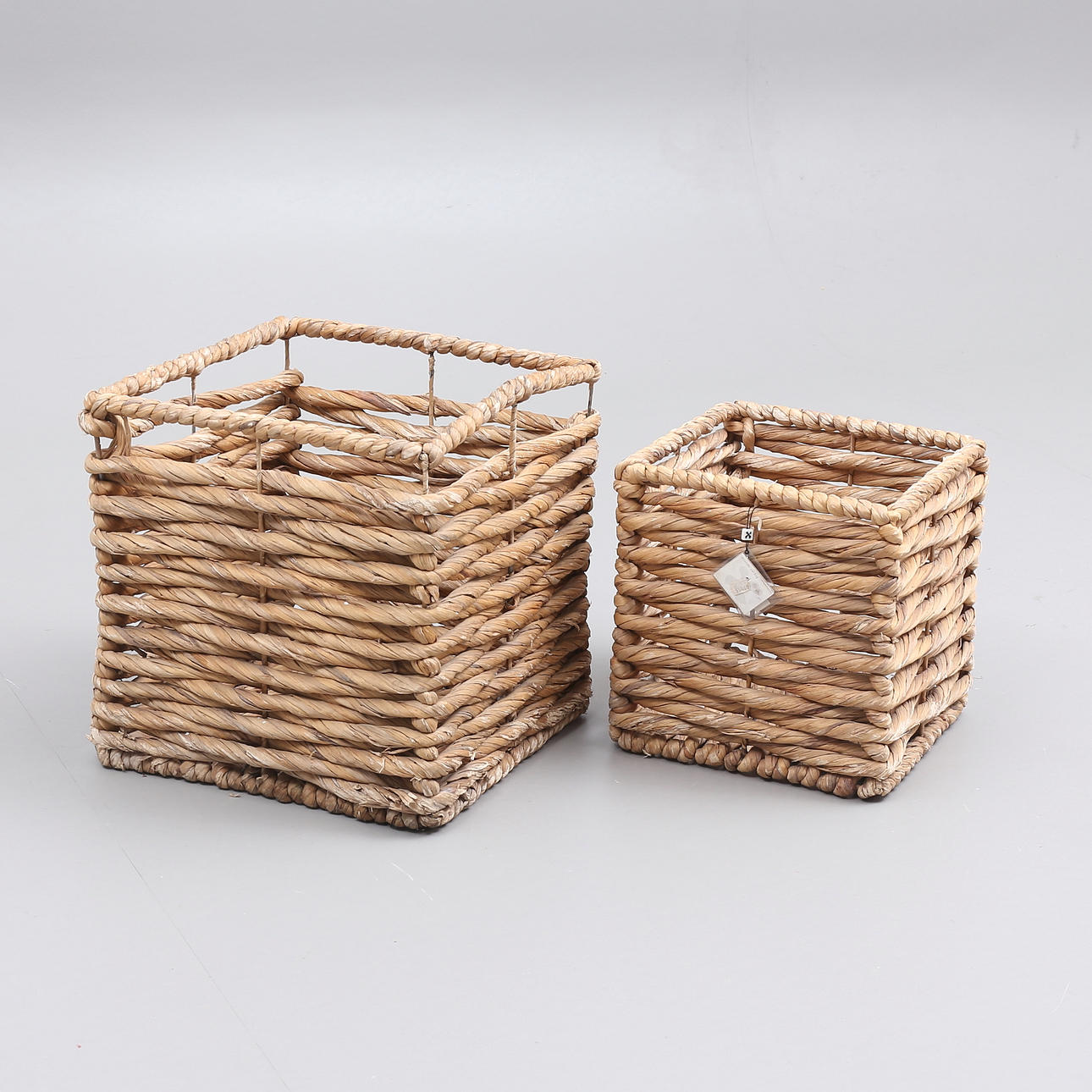 Un juego de 2 cestas de almacenamiento, Dixie Interior.