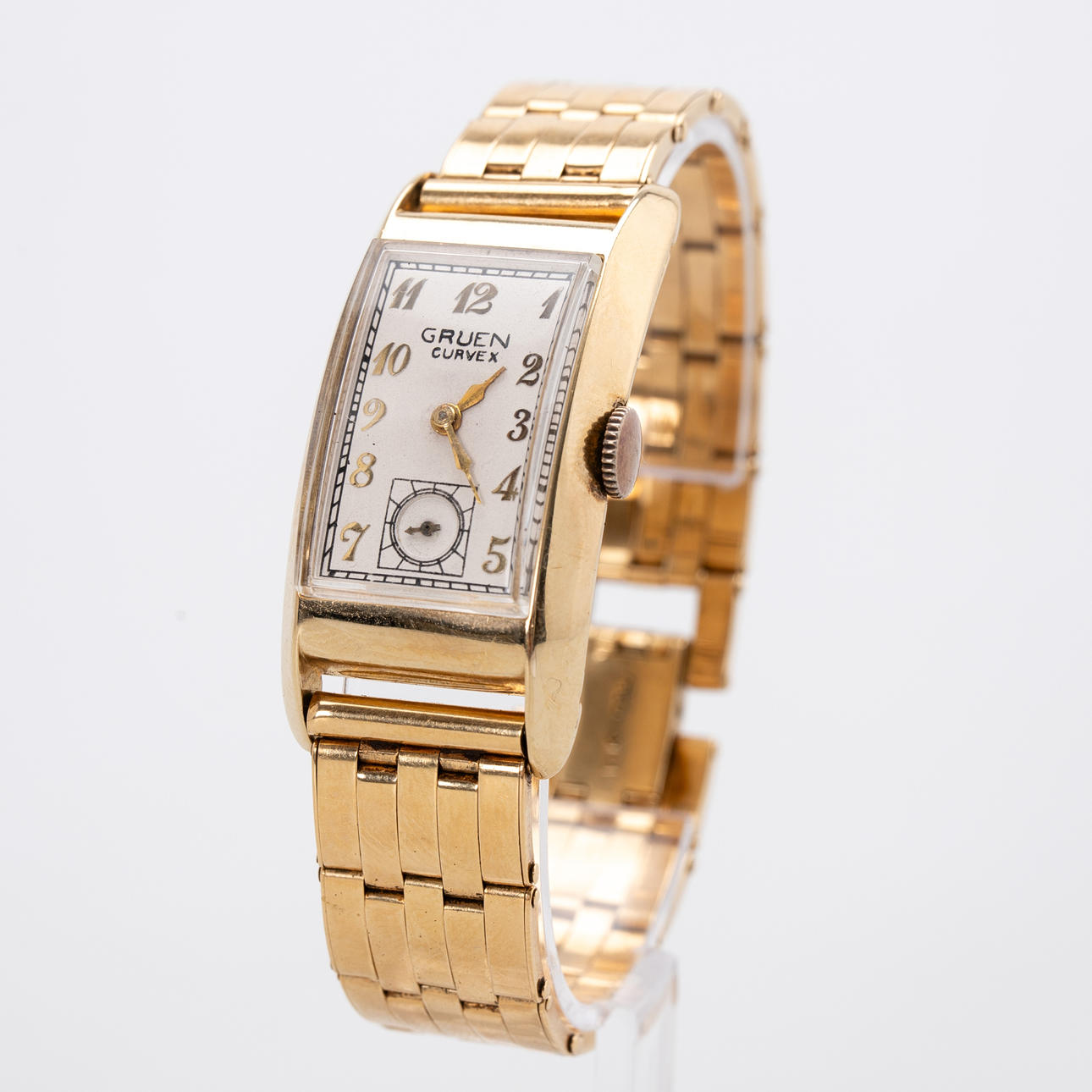 green wrist watch.