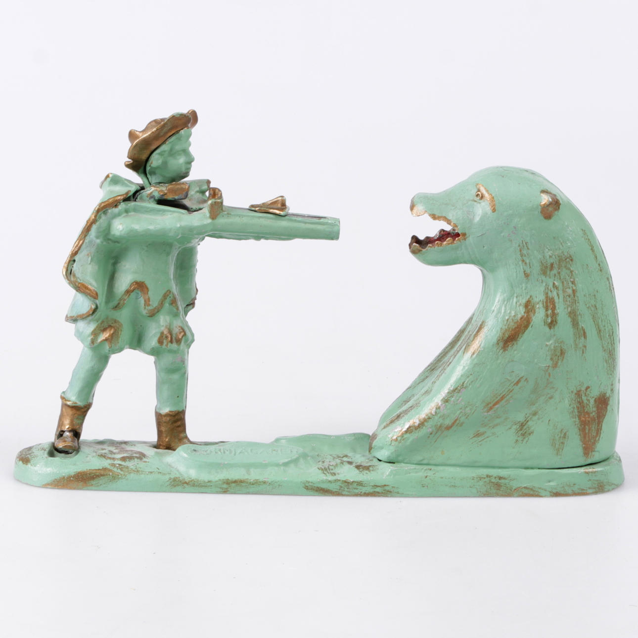 SPARBÖSSA, metall, "Björnjägaren", 1910.