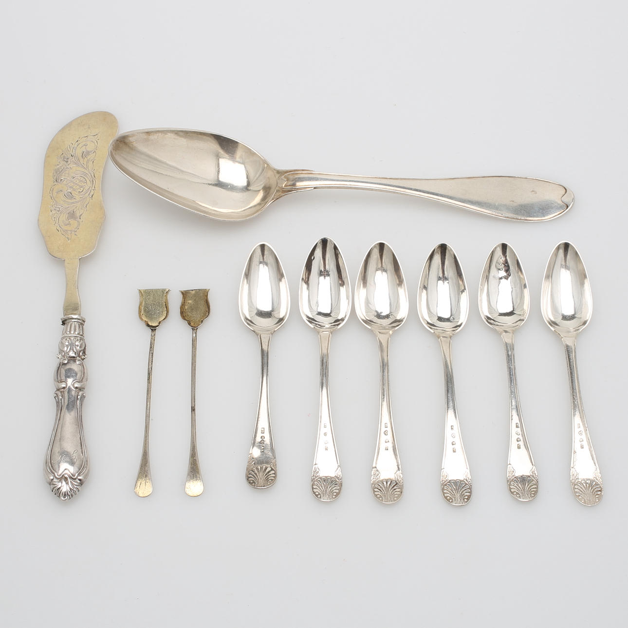 W AHNSTRÖM. 6 kaffeskedar, silver, 1875 samt 4 bestick, silver, 189 gram.