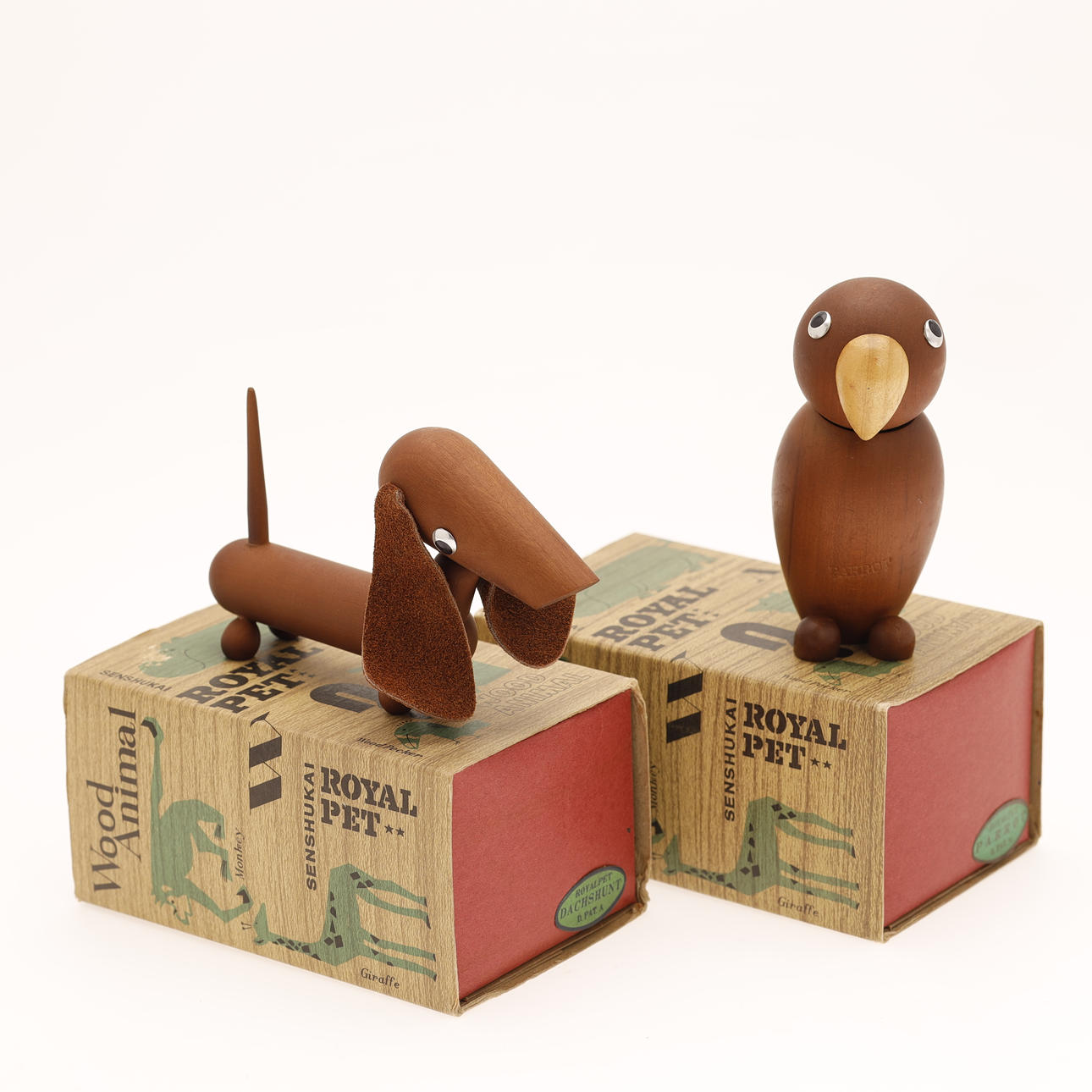 SENSHUKAI. Two Japanese carved cherry wood animals from the series