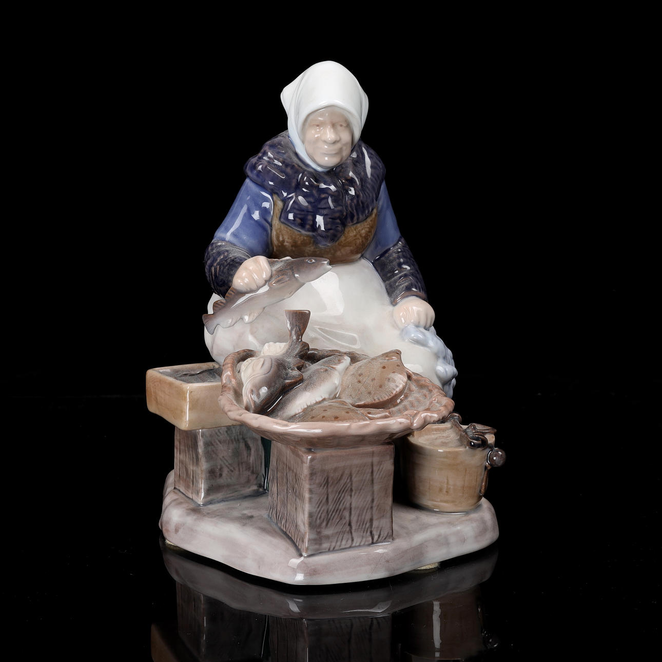 AXEL LOCHER. A porcelain figurine, “Fiskargumma”, Bing & Gröndahl ...