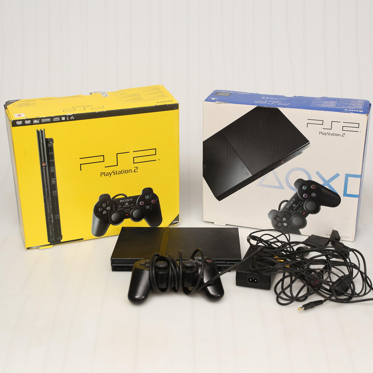 CONSOLAS DE JUEGOS, Playstation 2 con multi x, 3 piezas.