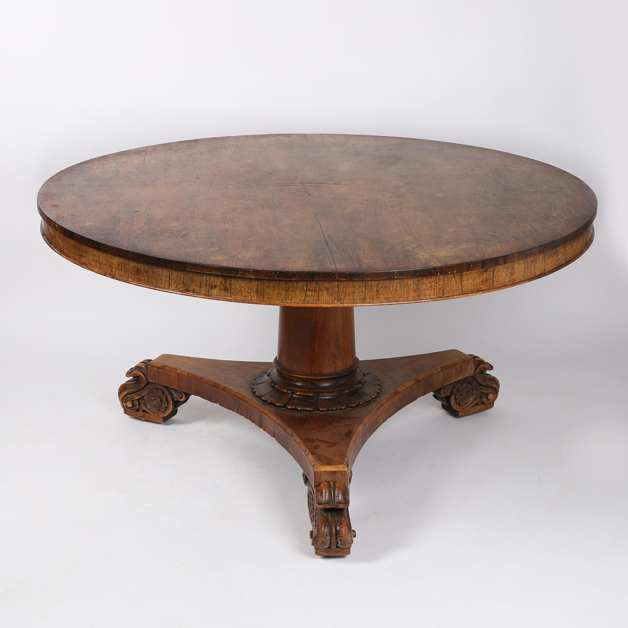 UNA MESA DE DESAYUNO DE PALISANDRO DEL SIGLO XIX.