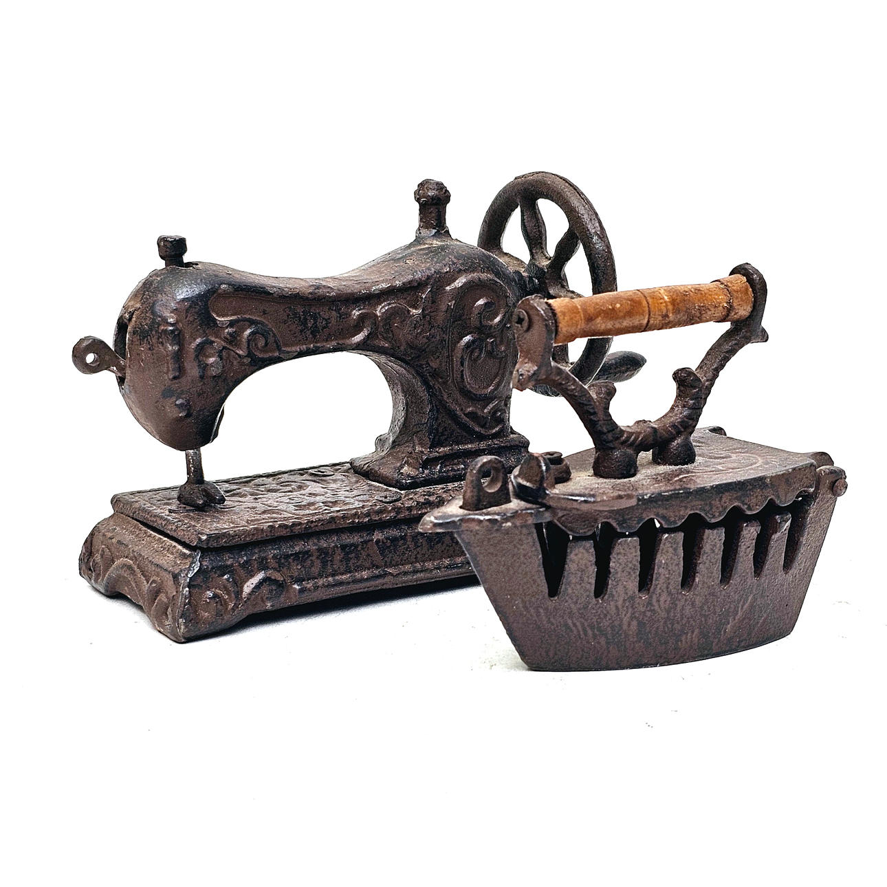 MINIATURE ANTIQUE SEWING MACHINE AND IRON.