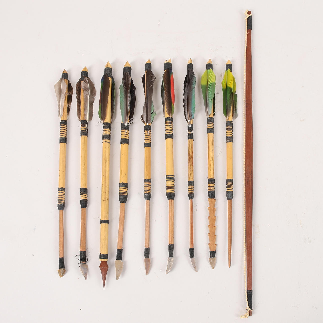 BUE MED PILE, bambus, træ & flint, 20. århundrede.