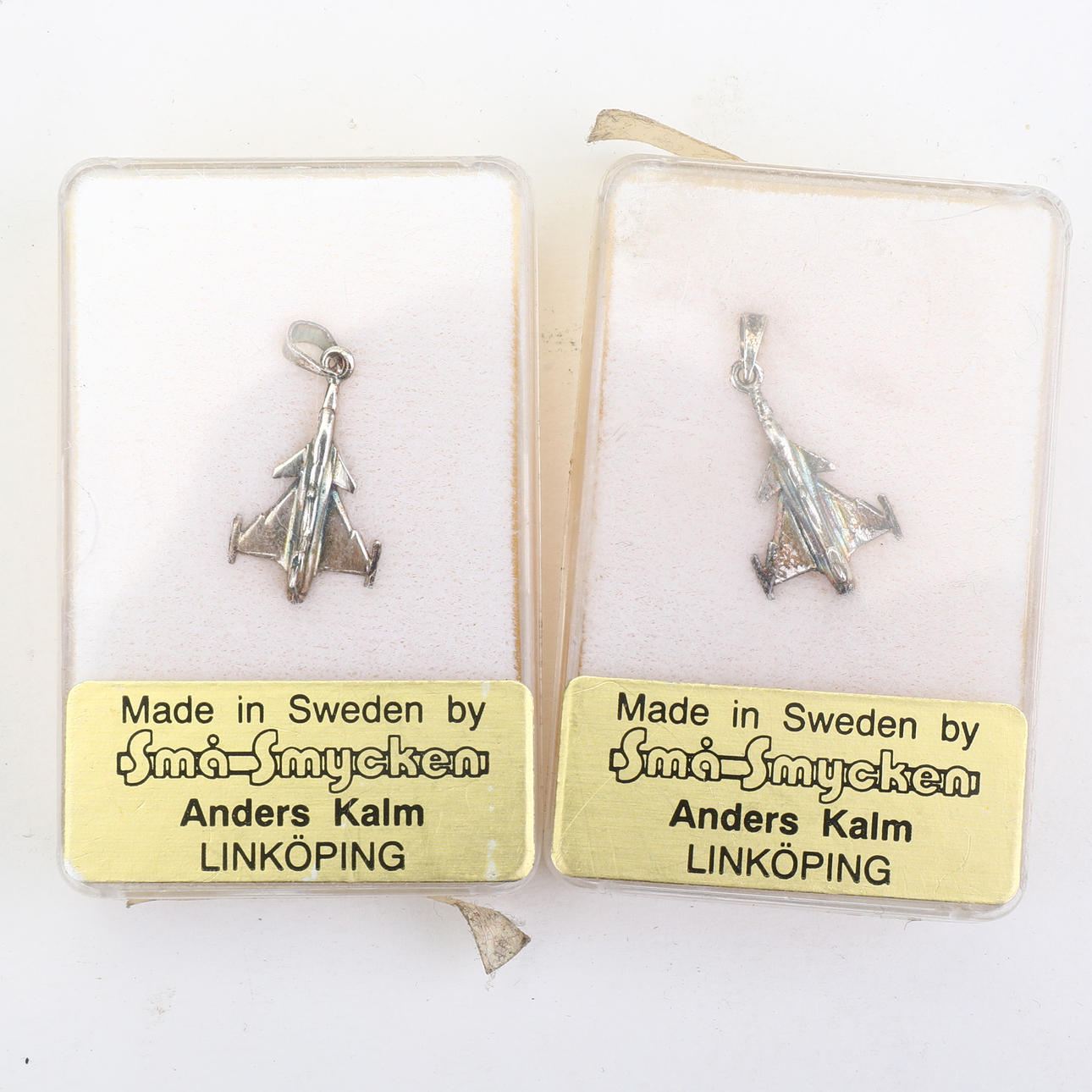 ANDERS KALM. Anhänger, 2 Stück, Sterlingsilber, Flugzeug.