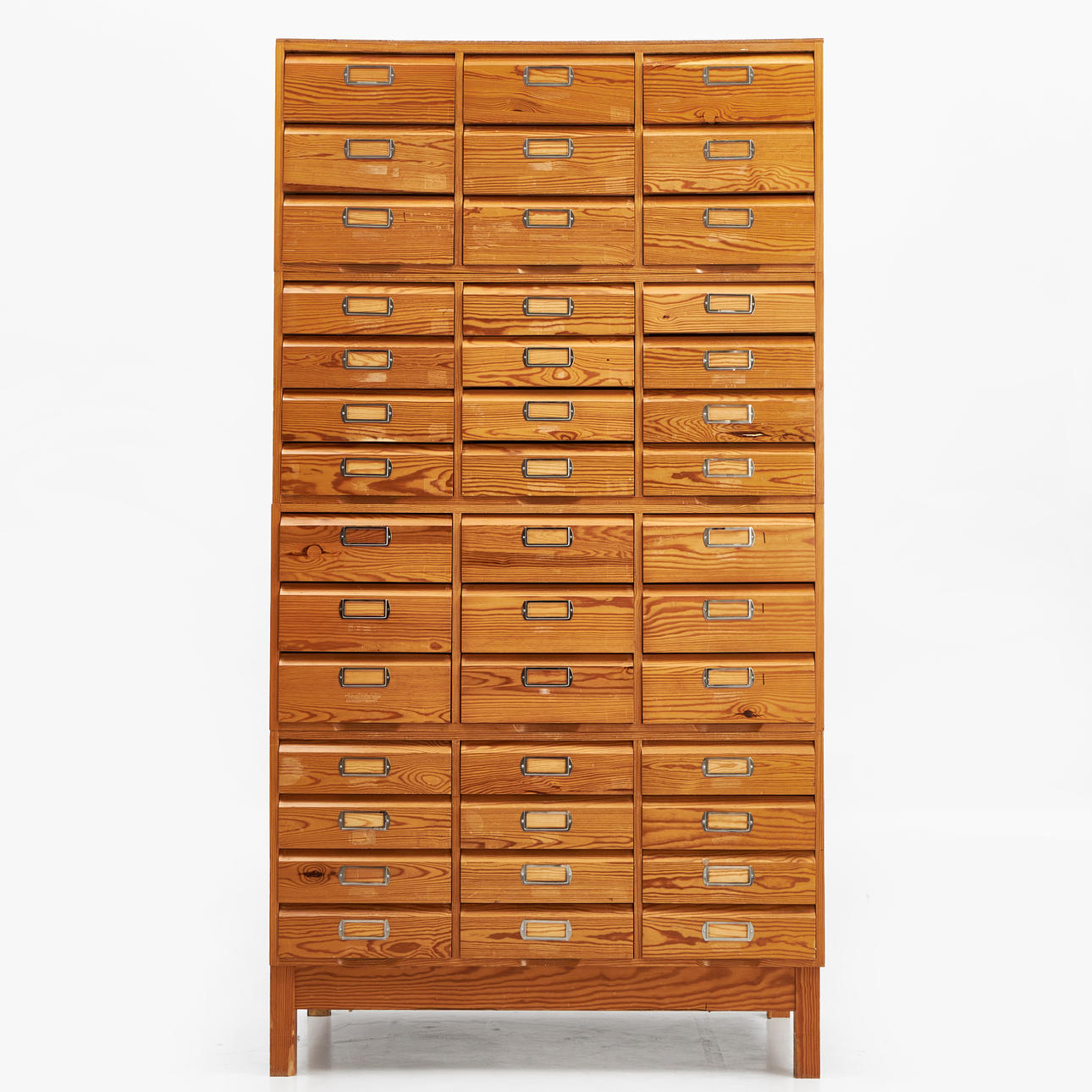 FILE CABINET on legs, pine, 4 divisible sections, total 42 drawers.