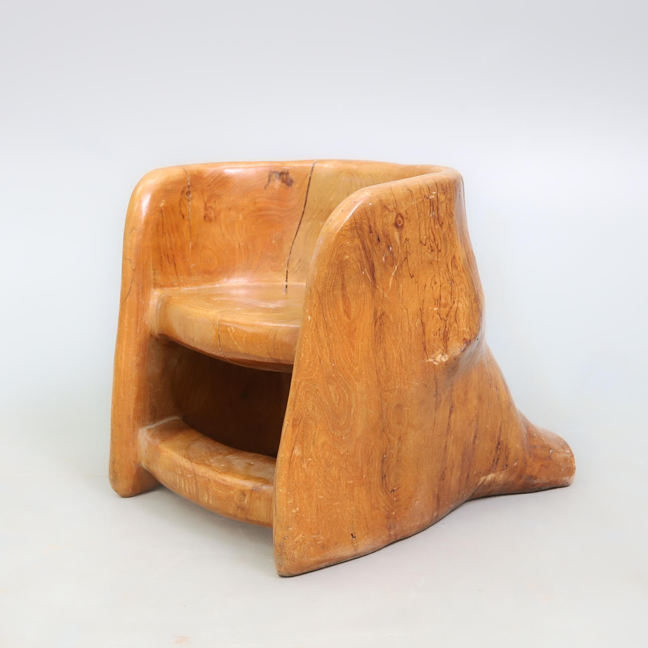 MAXIE LANE (1910-2014). A RUSTIC LOW CHAIR.