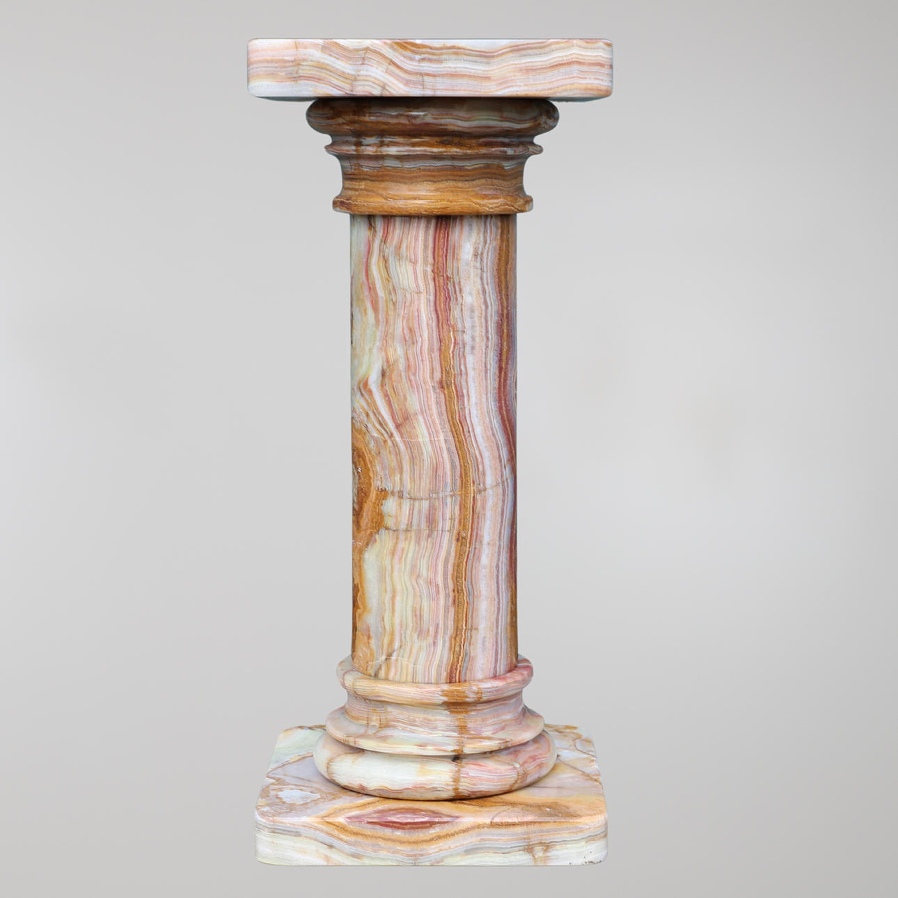 A MODERN ONYX PEDESTAL COLUMN.