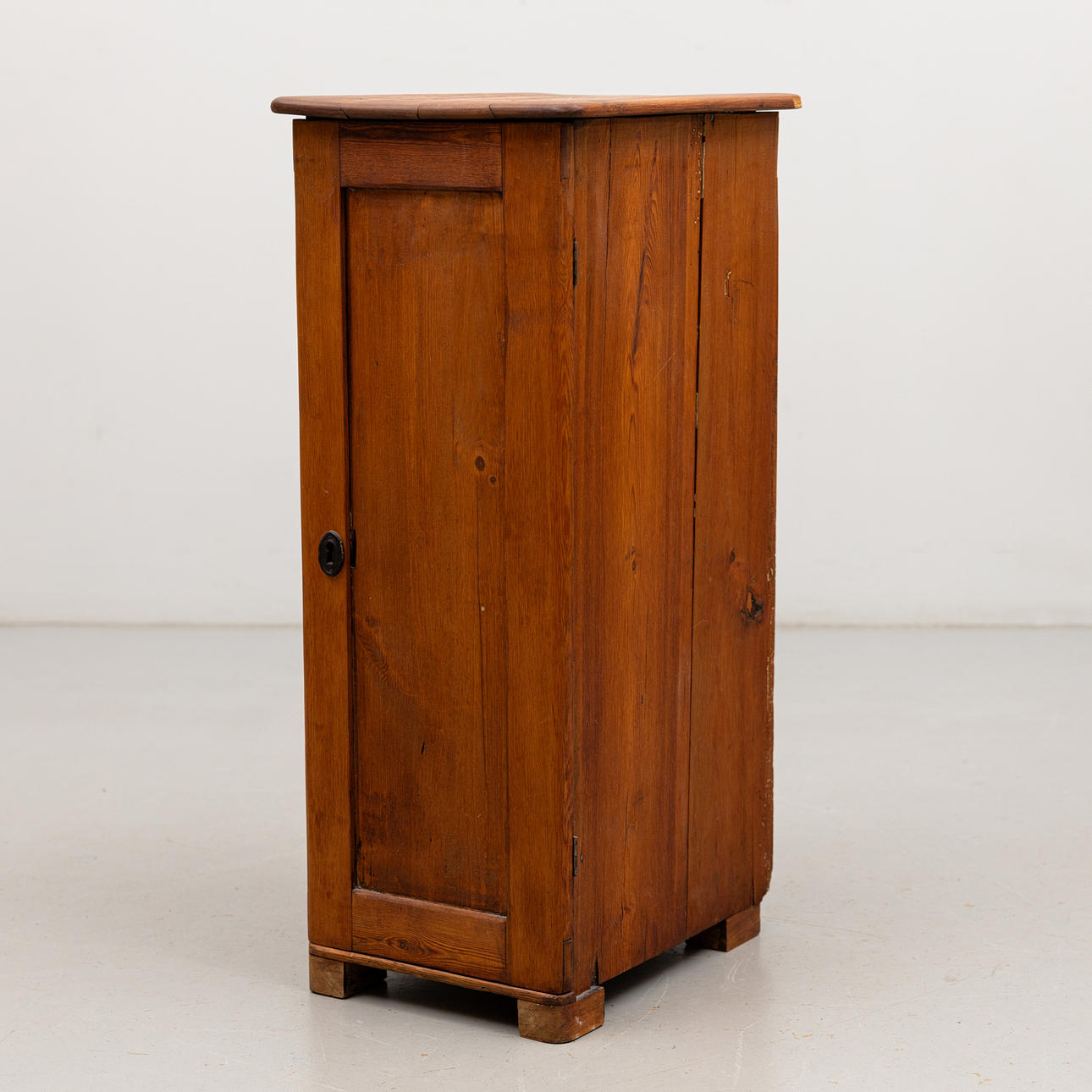 A late 19th century pine column cabinet.