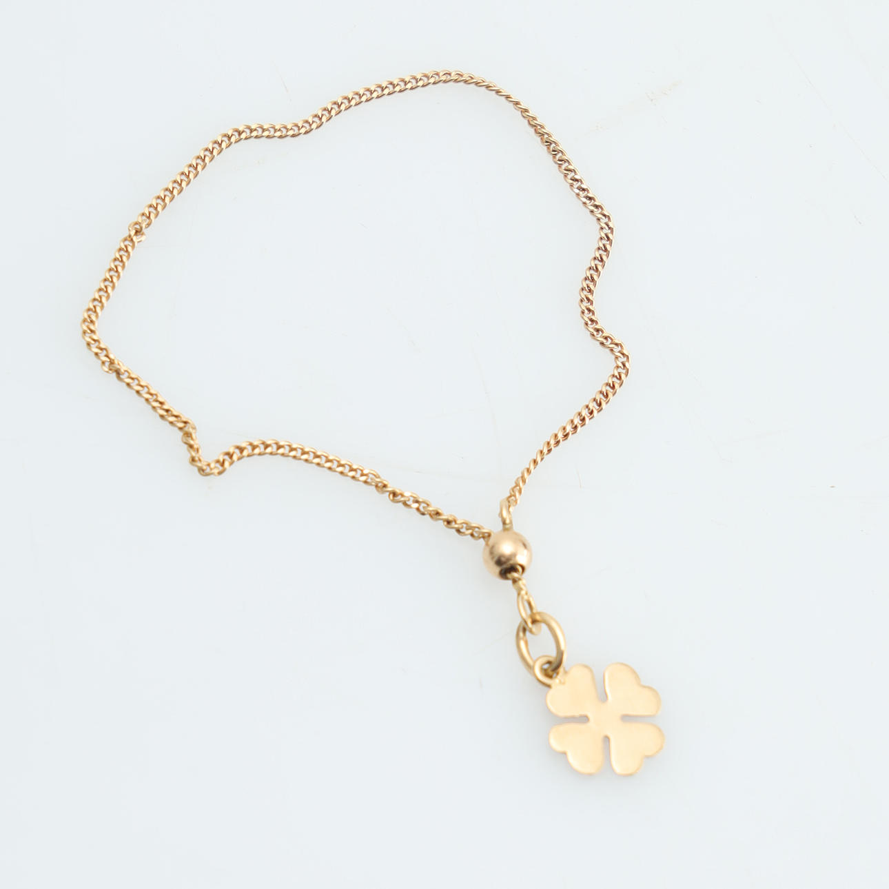 ARMBAND MED BERLOCK, 18K guld, för barn.