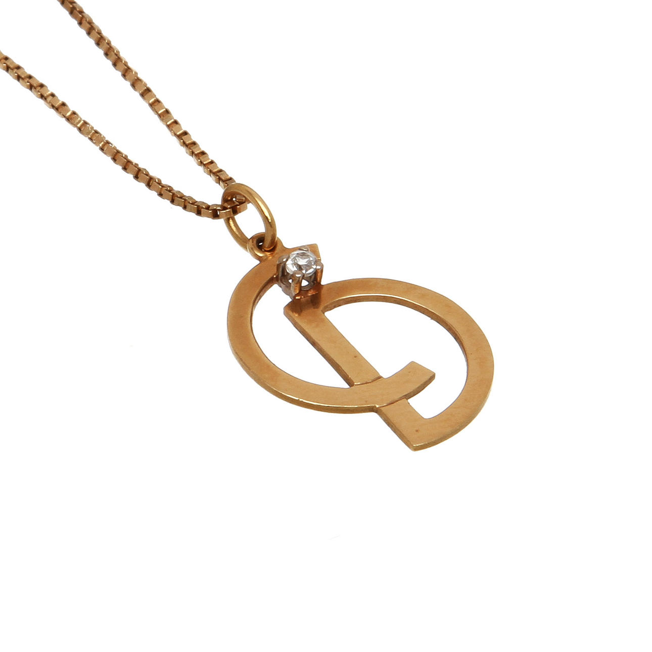 HALSKEDJA MED BERLOCK, 18 K guld samt syntetisk vit sten. Total vikt 4 gram.