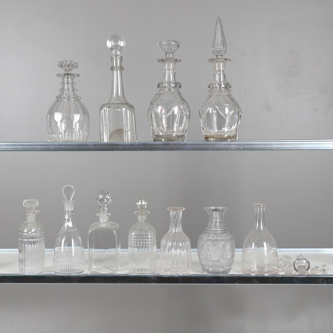 ANTIQUE DECANTERS & STOPPERS.