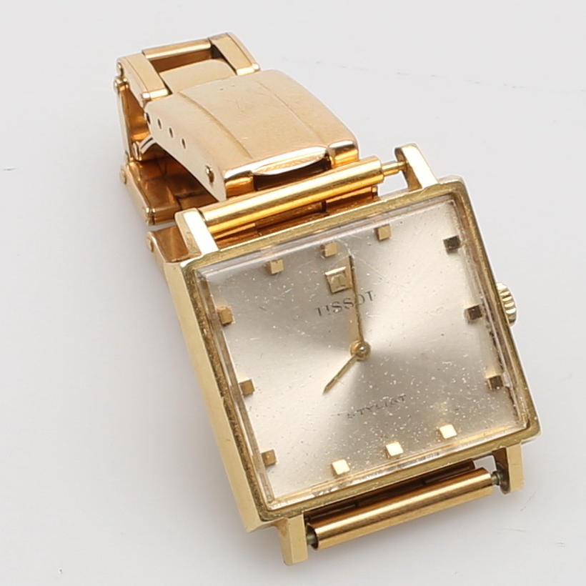 HERRARMBANDSUR, Tissot modell Stylist. 1960-tal 14 resp 18K guld. Vikt tot 59 g.