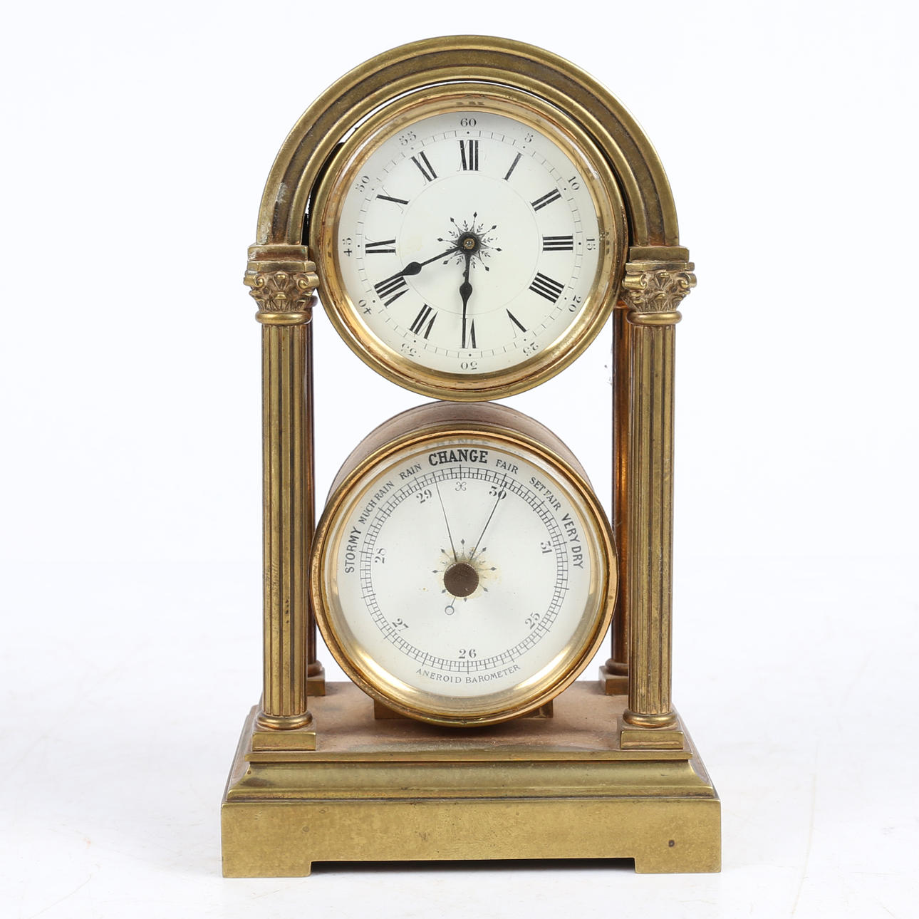 A BRASS CASED COMBIANTION DESK CLOCK AND ANEROID BAROMETER.